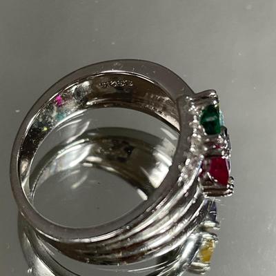 Sterling rings and small blue pin