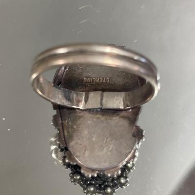 Sterling rings and small blue pin