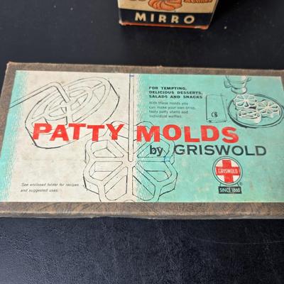 Vintage set of Griswold Patty Molds - Mirro "New Easy-Grip Cooky Press" in its original box and a vintage combination cake...