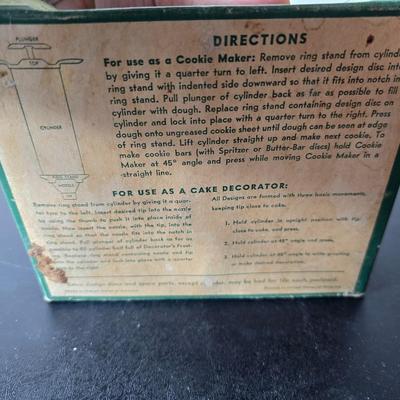 Vintage set of Griswold Patty Molds - Mirro "New Easy-Grip Cooky Press" in its original box and a vintage combination cake...