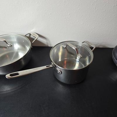 Nice Emeril three-piece pot & pan set, Wear-ever Aluminum pan with lid and a new Kitchen dish towel set