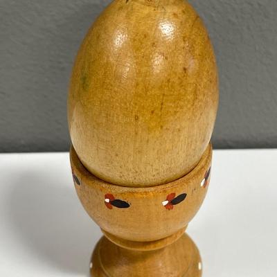 Hand painted wood egg in holder