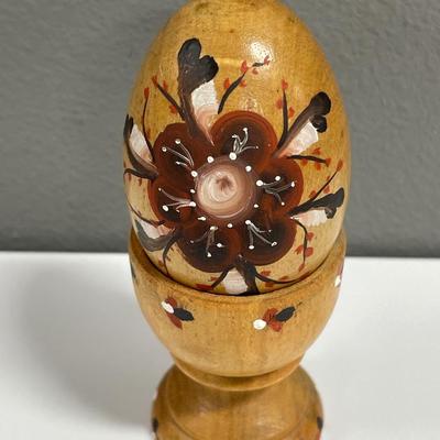 Hand painted wood egg in holder