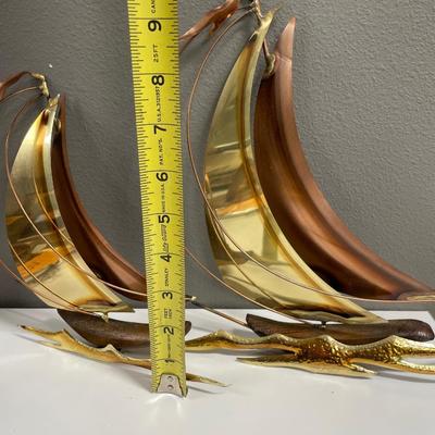Brass and wood sail boat wall hangings