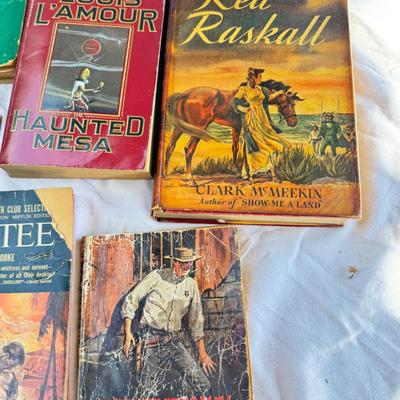 Sale Photo Thumbnail #24: Vintage cookbooks, religious books, Pulp Fiction, 2 Kennedy books. Bibles, and other spiritual books, unusual vintage cookbooks and paperback books. These books are in used conditions, with some damage, discoloration and may have writing.