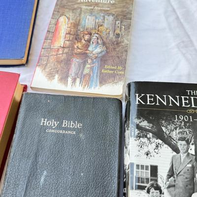 Sale Photo Thumbnail #29: Vintage cookbooks, religious books, Pulp Fiction, 2 Kennedy books. Bibles, and other spiritual books, unusual vintage cookbooks and paperback books. These books are in used conditions, with some damage, discoloration and may have writing.