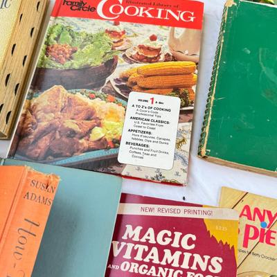 Sale Photo Thumbnail #25: Vintage cookbooks, religious books, Pulp Fiction, 2 Kennedy books. Bibles, and other spiritual books, unusual vintage cookbooks and paperback books. These books are in used conditions, with some damage, discoloration and may have writing.