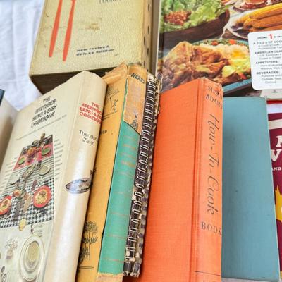 Sale Photo Thumbnail #20: Vintage cookbooks, religious books, Pulp Fiction, 2 Kennedy books. Bibles, and other spiritual books, unusual vintage cookbooks and paperback books. These books are in used conditions, with some damage, discoloration and may have writing.