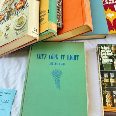 Sale Photo Thumbnail #30: Vintage cookbooks, religious books, Pulp Fiction, 2 Kennedy books. Bibles, and other spiritual books, unusual vintage cookbooks and paperback books. These books are in used conditions, with some damage, discoloration and may have writing.