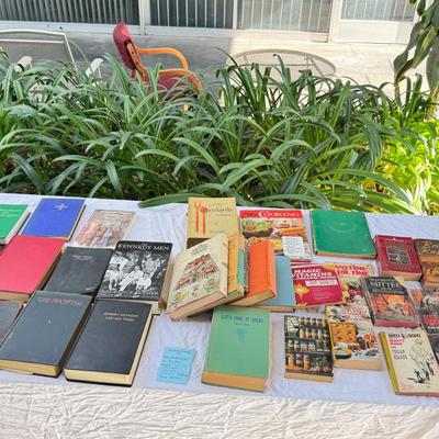 Sale Photo Thumbnail #19: Vintage cookbooks, religious books, Pulp Fiction, 2 Kennedy books. Bibles, and other spiritual books, unusual vintage cookbooks and paperback books. These books are in used conditions, with some damage, discoloration and may have writing.