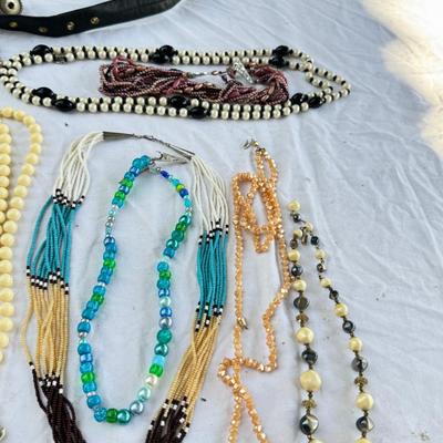 Sale Photo Thumbnail #47: Costume Jewelry Necklaces 64 beaded, Many lengths and sizes of faux pearl strands. Mardi Gras beads not included in count. Display NOT included.