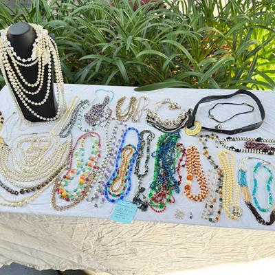 Sale Photo Thumbnail #39: Costume Jewelry Necklaces 64 beaded, Many lengths and sizes of faux pearl strands. Mardi Gras beads not included in count. Display NOT included.