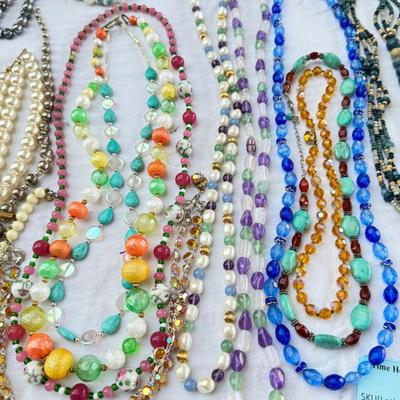 Sale Photo Thumbnail #42: Costume Jewelry Necklaces 64 beaded, Many lengths and sizes of faux pearl strands. Mardi Gras beads not included in count. Display NOT included.