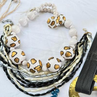 Sale Photo Thumbnail #50: Costume Jewelry Necklaces 64 beaded, Many lengths and sizes of faux pearl strands. Mardi Gras beads not included in count. Display NOT included.