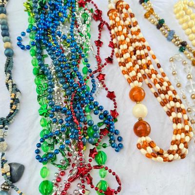 Sale Photo Thumbnail #45: Costume Jewelry Necklaces 64 beaded, Many lengths and sizes of faux pearl strands. Mardi Gras beads not included in count. Display NOT included.