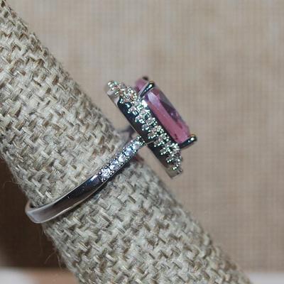 Size 6 PINK Rectangle Main Stone Ring with a Full Nest Surround & 12 Stone Sides on a Silver Tone Band (5.5g)