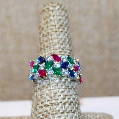 Size 7 Red, Green. Blue & Clear Stones Party Ring on a Silver Tone Band (4.2g)