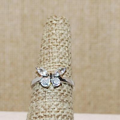 Size 7 Butterfly Ring with 2 Round Cut & 2 Marquise Cut Clear Stones on a Silver Tone Band (2.2g)