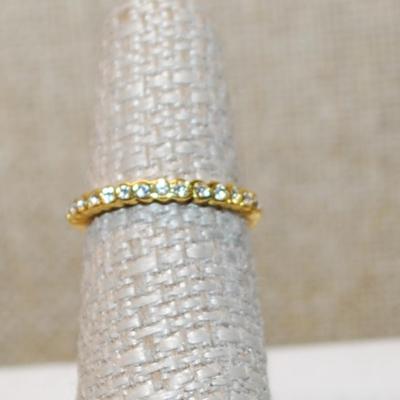 Size 6¾ Semi Infinity Ring with 15 Round Clear Stones on a Gold Tone Band (1.6g)