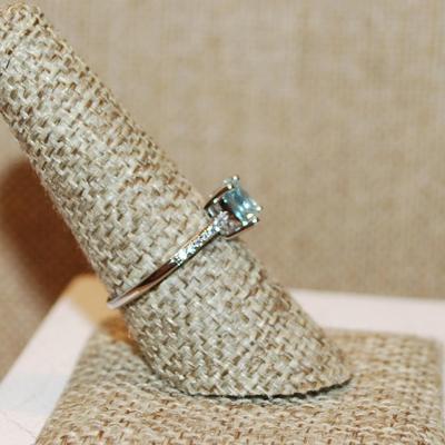 Size 8¼ Transparent Light Blue Stone Asscher Cut Ring 4 Prong with Side Accents on a Silver Tone Band (1.8g)