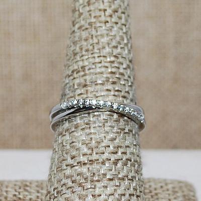 Size 8 Half Infinity Criss-Cross Ring with 2 Rows of Small Stone Accents on a Silver Tone Band (2.4g)
