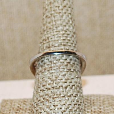 Size 10½ Marked .925 Large ORANGE AMBER Oval Stone with Nested Full Surround on a Silver Band (8.7g)