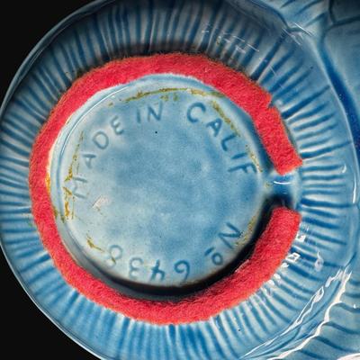 Sale Photo Thumbnail #37: Blue in color. Marked on the bottom: “Made in California. No. 6438.” Age related wear. Measurement: 13" x 8.5". [CS]