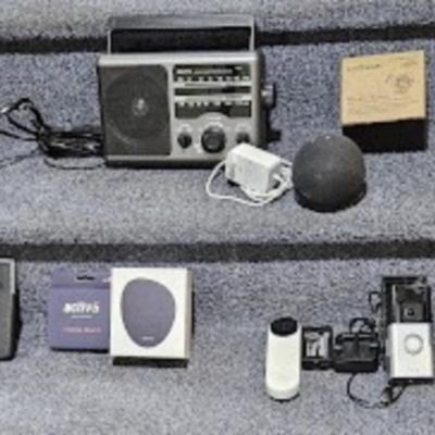 Electronic Lot, calculator, electronic exerciser w/stand, Google ring doorbell camera, Google camera, Echo Dot, AM/FM radio