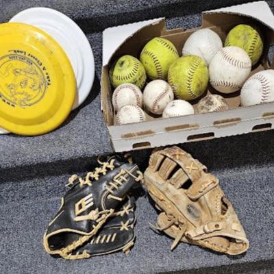 Footballs, baseballs, playing cards, card game, CD's in case, (3) frisbees, (2) baseball gloves,