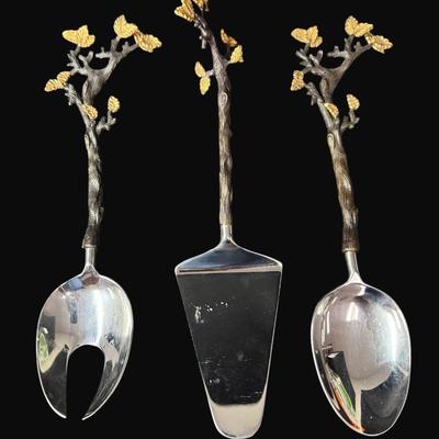 Sale Photo Thumbnail #90: This server assortment includes a cake server and salad servers. All manufactured by L'Objet. This is a three-piece set.  Cake server is 12.5" and the salad server is 12". [CS]