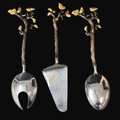 Sale Photo Thumbnail #91: This server assortment includes a cake server and salad servers. All manufactured by L'Objet. This is a three-piece set.  Cake server is 12.5" and the salad server is 12". [CS]