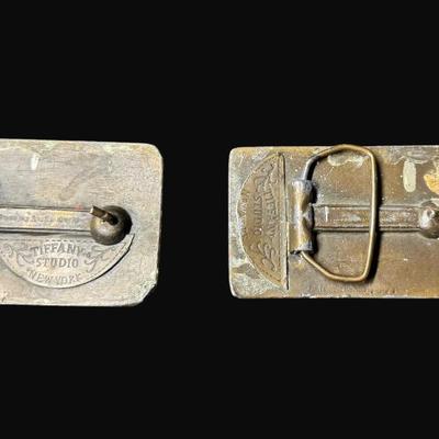 Sale Photo Thumbnail #97: Includes Colt Revolvers, and Sharp's Rifle Company. Total of two pieces. Age related wear throughout. Sharp's belt buckle has some minor damage on corner (pictured). [JP]