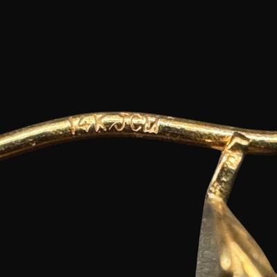 Sale Photo Thumbnail #104: **WIRE TRANSFER IS REQUIRED IF SHIPPED.** [1.72g] These diamond cut earrings are fashioned in yellow gold. There are some minor dents on the inside of these hoops when viewed under magnification. Approximate diameter is .75". **ALL PRECIOUS METALS SALES A