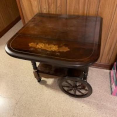 Sale Photo Thumbnail #21: A very unique painted rolling cart. Would make a great bar cart. Dimensions are 29" tall 34" wide ( open) &27" deep