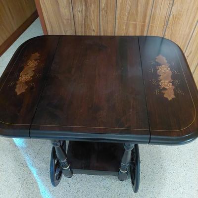 Sale Photo Thumbnail #23: A very unique painted rolling cart. Would make a great bar cart. Dimensions are 29" tall 34" wide ( open) &27" deep