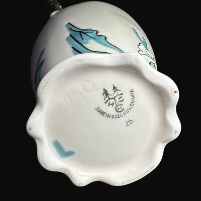 Sale Photo Thumbnail #160: Pink in color, with gold accents. Includes an Art Nouveau vase (9"H), a handled carafe (9.5"), and a handled candy dish. Total of three pieces. [RE]