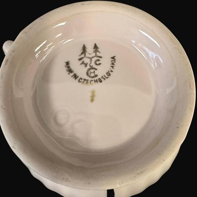 Sale Photo Thumbnail #170: Footed mug set with gold accents. Age related wear. Total of four pieces. Measurement: 3.75"H (each). [RE]