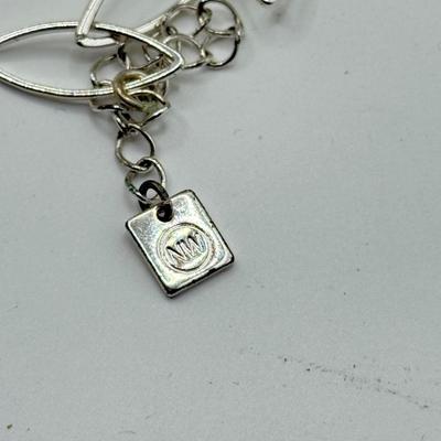 LOT 46J: Goldtone & Silvertone Necklaces: Napier, Nine West & More