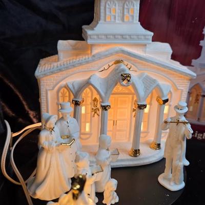 Porcelain Illuminated “Christmas Church & Caroler” 8-Piece Lighted Holiday Village Set – White & Gold Accents