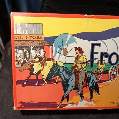 WALT DISNEY'S OFFICIAL FRONTIERLAND GAME WITH METAL PLAY PIECES