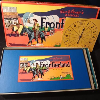 WALT DISNEY'S OFFICIAL FRONTIERLAND GAME WITH METAL PLAY PIECES