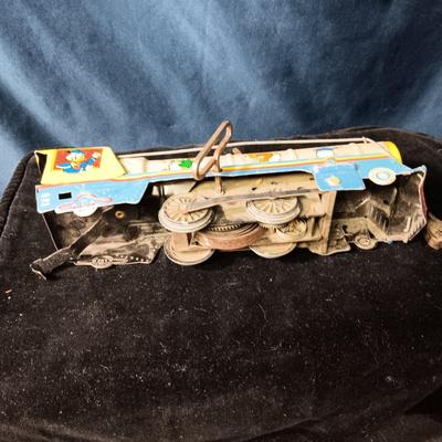 WALT DISNEY PRODUCTIONS TIN LITHO WIND UP TRAIN BY MARX (IN NEED OF REPAIR)
