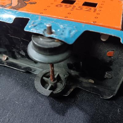 WALT DISNEY PRODUCTIONS TIN LITHO WIND UP TRAIN BY MARX (IN NEED OF REPAIR)