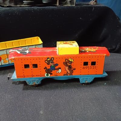WALT DISNEY PRODUCTIONS TIN LITHO WIND UP TRAIN BY MARX (IN NEED OF REPAIR)