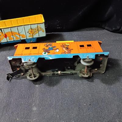 WALT DISNEY PRODUCTIONS TIN LITHO WIND UP TRAIN BY MARX (IN NEED OF REPAIR)