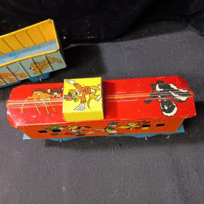 WALT DISNEY PRODUCTIONS TIN LITHO WIND UP TRAIN BY MARX (IN NEED OF REPAIR)