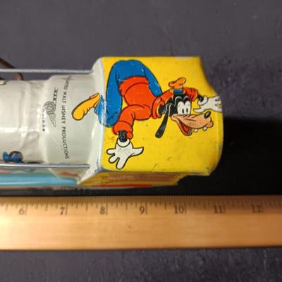 WALT DISNEY PRODUCTIONS TIN LITHO WIND UP TRAIN BY MARX (IN NEED OF REPAIR)