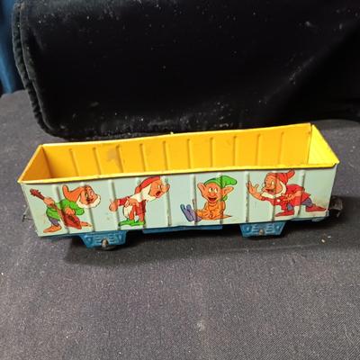 WALT DISNEY PRODUCTIONS TIN LITHO WIND UP TRAIN BY MARX (IN NEED OF REPAIR)