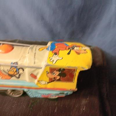 WALT DISNEY PRODUCTIONS TIN LITHO WIND UP TRAIN BY MARX (IN NEED OF REPAIR)