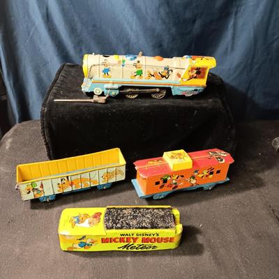 WALT DISNEY PRODUCTIONS TIN LITHO WIND UP TRAIN BY MARX (IN NEED OF REPAIR)